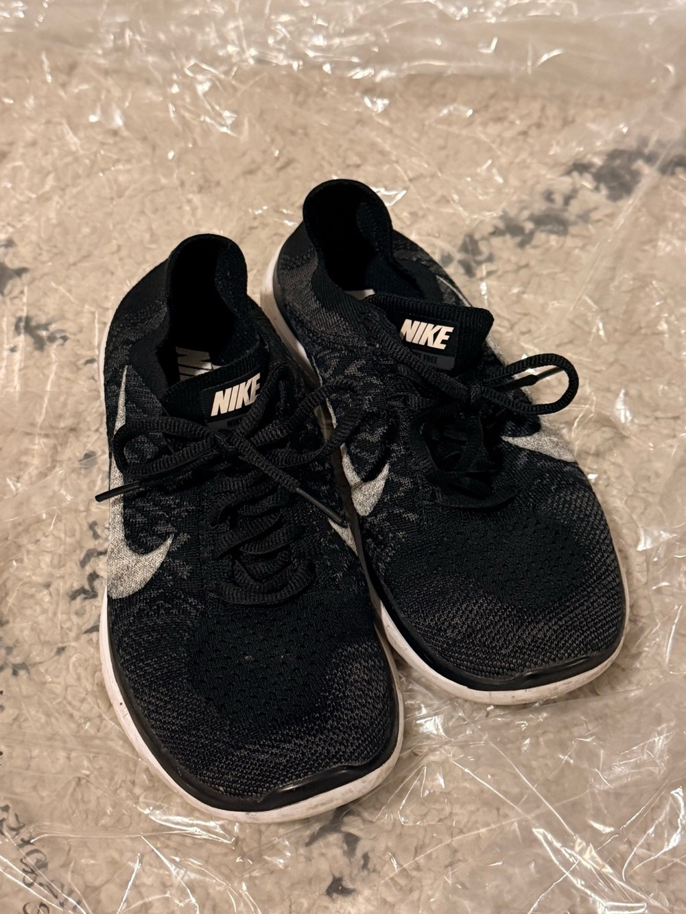 Nike Black and White Free 4.0 Flyknit iD
Women's Running Shoes Sneakers - Size 6